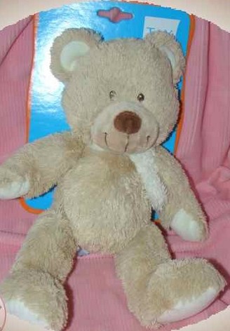 Doudou ourson beige 28cm, gare tram Mangin, à Nantes sur un banc