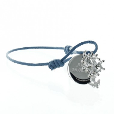 Médaille en métal argenté en forme de galet