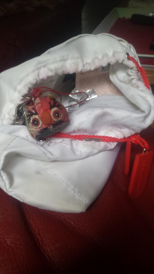 petit sac blanc avec clefs