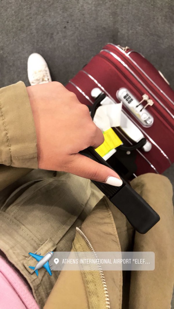 Valise rouge/bordeaux en gare Entzheim