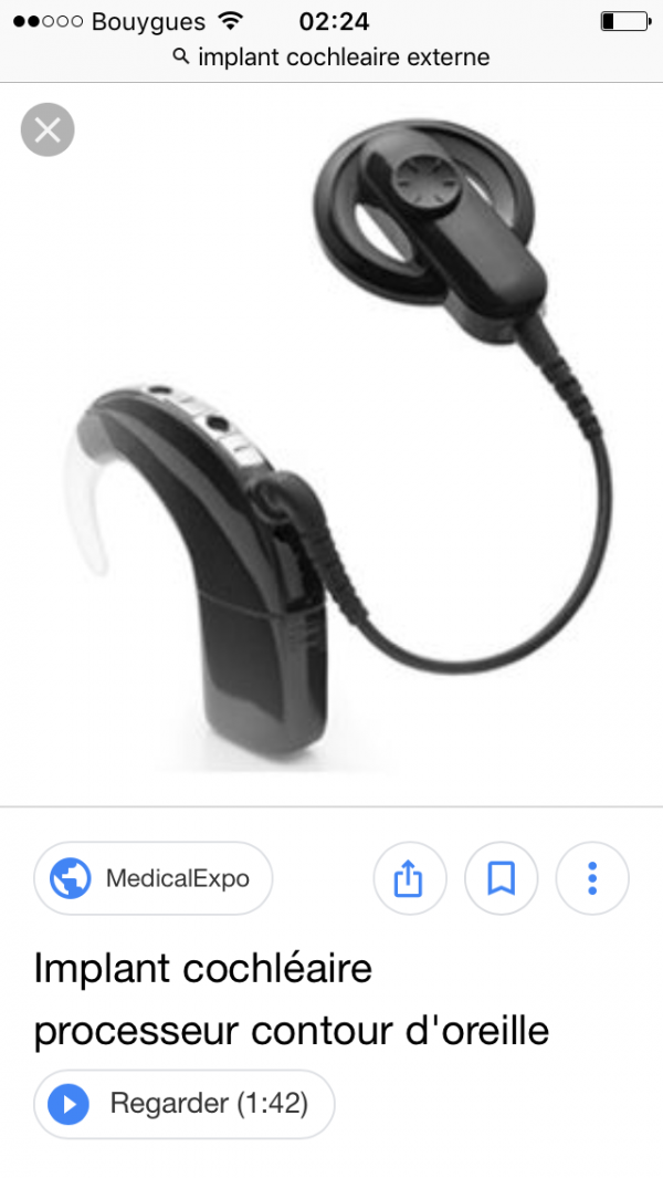 Appareil auditif d un implant cochléaire marron foncé à la foire stMichel au Havre
