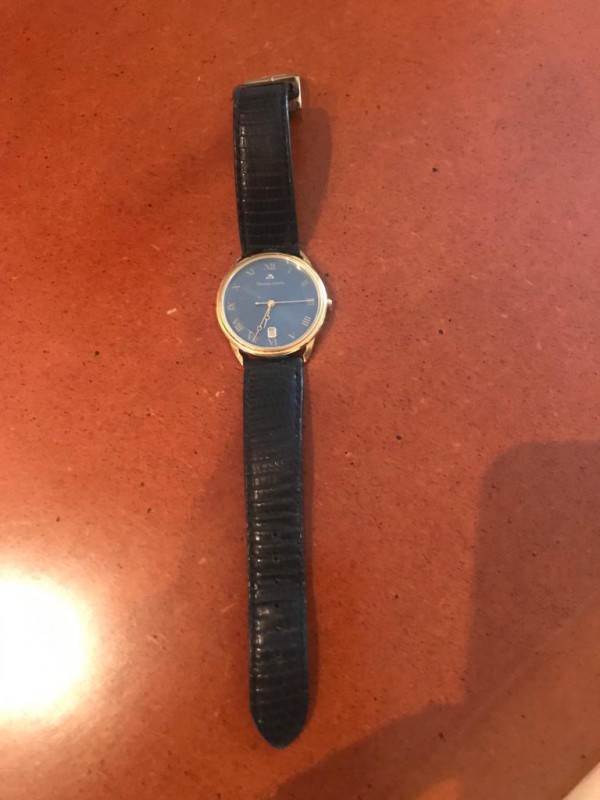 Montre doree Maurice deLacroix