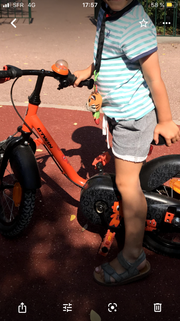Velo enfant btwin orange et noir