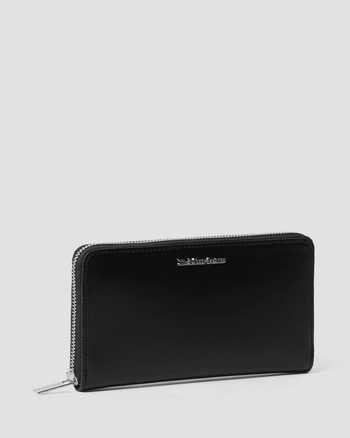 Vol Sac Eastpak bleu + porte monnaie Dr Martens Plage de La Source Penestin.