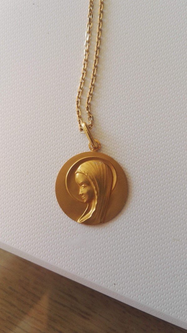Médaille de Baptème à Dolus d'Oléron, vraisemblablement sur la plage.