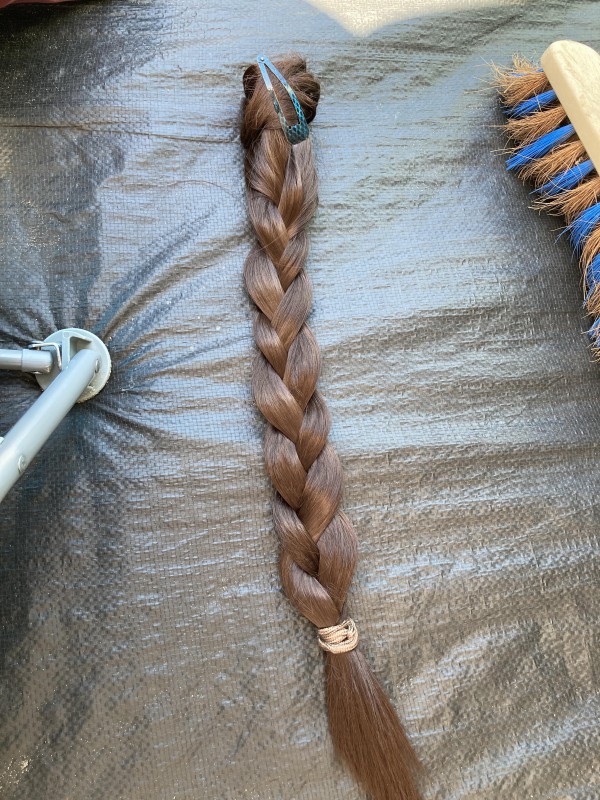 Faux cheveux tresses Soulac sur mer parking à côté du Casino