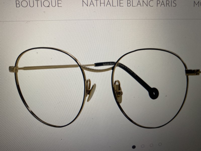 Lunettes vue noires rondes barre dorée petit palais ou environs