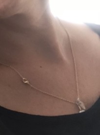 Pendentif doré avec 2 coquillages
