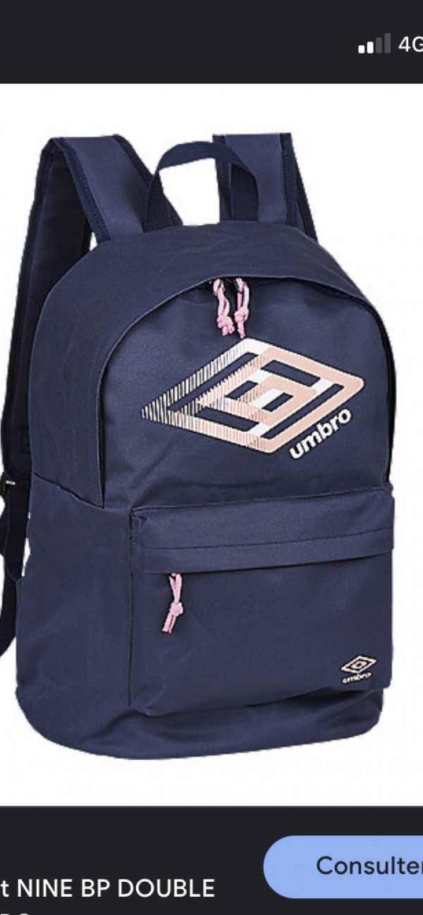 Sac à dos bleu marine et rose UMBRO dans le TER gare de Sete