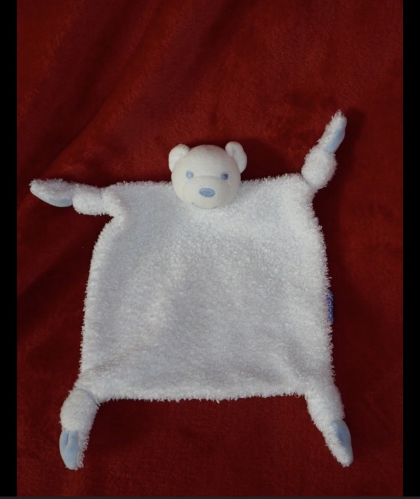 Doudou petit ourse très déchiré