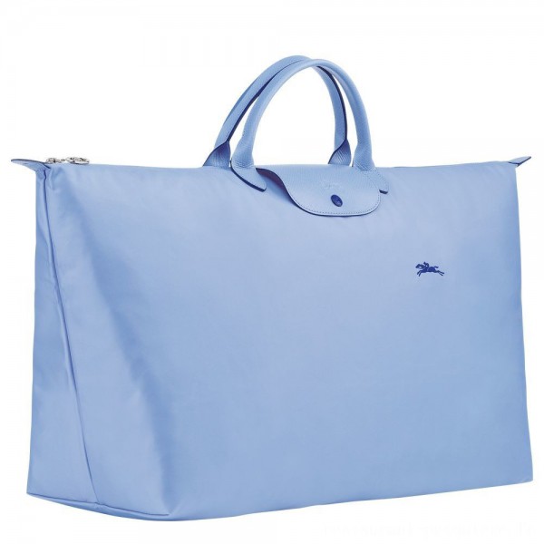 perdu sac bleu avec lanières beige assez gros