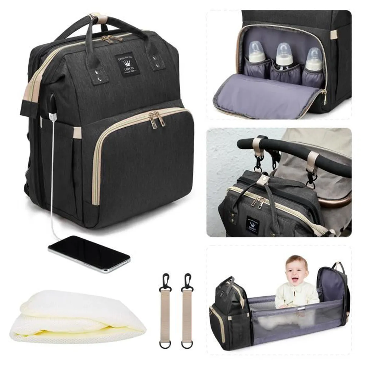 Sac à langer noir contenant vêtements & jeux enfants